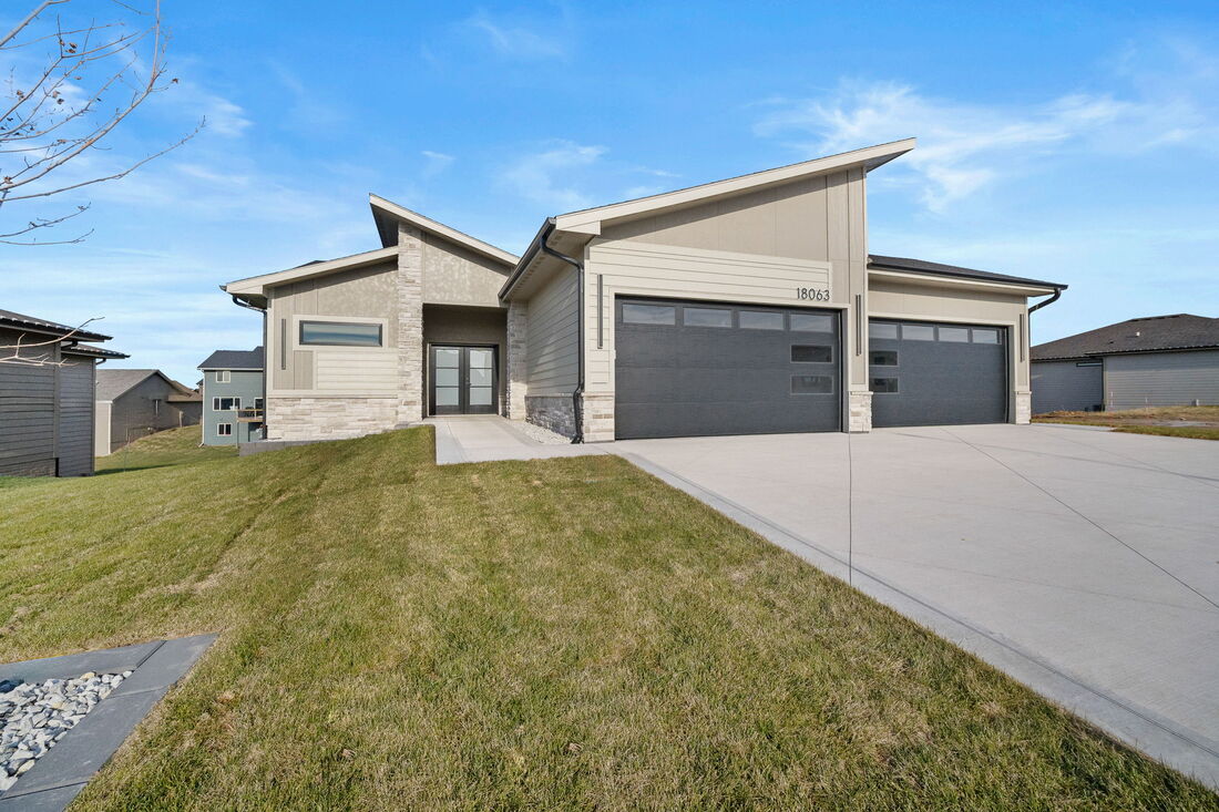Contemporary custom build with bold rooflines